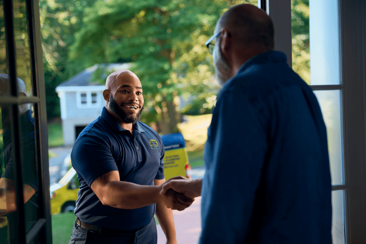 Technician shaking customers hand